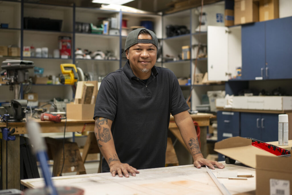 Image description: Portrait of Rudie Tanudtanud in a workshop. End of alt text.